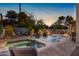 Luxury backyard oasis featuring a sparkling pool, spa, and fire features at 3675 N 59Th Pl, Phoenix, AZ 85018