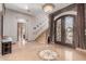 Elegant entryway with ornate double doors and a grand staircase at 3675 N 59Th Pl, Phoenix, AZ 85018