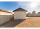 Detached storage shed in the backyard at 3921 W Griswold Rd, Phoenix, AZ 85051