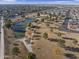 Aerial view of a park with pond and walking paths at 4047 E Catalina Cir, Mesa, AZ 85206