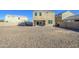 Large backyard with gravel and a partial view of the home at 4689 E Argentite St, San Tan Valley, AZ 85143