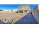 Large backyard with gravel and a partial view of the home at 4689 E Argentite St, San Tan Valley, AZ 85143