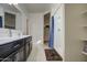 Bathroom with double vanity and walk-in shower at 4689 E Argentite St, San Tan Valley, AZ 85143
