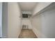 Spacious walk-in closet with shelving and hanging rods at 4689 E Argentite St, San Tan Valley, AZ 85143