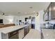 Modern kitchen with granite countertops and stainless steel appliances at 4689 E Argentite St, San Tan Valley, AZ 85143