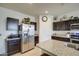 Modern kitchen with stainless steel appliances and granite countertops at 4689 E Argentite St, San Tan Valley, AZ 85143