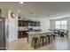 Modern kitchen with granite island and stainless steel appliances at 4689 E Argentite St, San Tan Valley, AZ 85143