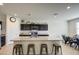 Modern kitchen with granite countertops and dark brown cabinets at 4689 E Argentite St, San Tan Valley, AZ 85143