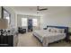 Main bedroom with king-size bed and bookcase at 4689 E Argentite St, San Tan Valley, AZ 85143