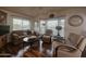 Bright and airy living room with bay windows and seating at 650 N Hawes Rd # 5439, Mesa, AZ 85207