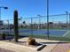 Community tennis courts with surrounding fence at 650 N Hawes Rd # 5439, Mesa, AZ 85207