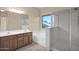 Bathroom with double vanity, soaking tub, and shower at 66 W Hayden Park Rd, San Tan Valley, AZ 85143