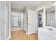 Bathroom with double vanity, walk-in shower, and access to closets at 942 N Miramar --, Mesa, AZ 85213