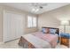 Cozy bedroom featuring a double bed and ample closet space at 942 N Miramar --, Mesa, AZ 85213