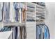 Large walk-in closet with ample shelving and hanging space at 942 N Miramar --, Mesa, AZ 85213