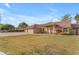 House exterior boasts a well-manicured lawn and two car garage at 942 N Miramar --, Mesa, AZ 85213
