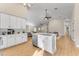 Modern kitchen with white cabinets and center island at 942 N Miramar --, Mesa, AZ 85213