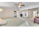 Main bedroom with king bed, TV, and access to a private gym area at 942 N Miramar --, Mesa, AZ 85213