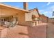 Outdoor kitchen and dining area on a brick patio, adjacent to the house at 942 N Miramar --, Mesa, AZ 85213