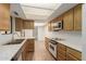 Efficient kitchen with ample counter space and appliances at 10214 E Michigan Ave, Sun Lakes, AZ 85248