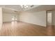 Spacious living room with vaulted ceilings and wood floors at 10214 E Michigan Ave, Sun Lakes, AZ 85248