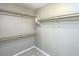 Spacious walk-in closet with double hanging rods at 1089 S Annie Ln, Gilbert, AZ 85296