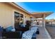 Patio furniture on a spacious backyard patio at 12414 W Cougar Dr, Sun City West, AZ 85375