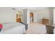 Bedroom with a view of the bathroom and open shelving at 16010 E El Lago Blvd, Fountain Hills, AZ 85268