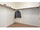 Large walk-in closet with double hanging rods at 19522 N 84Th Ave, Peoria, AZ 85382