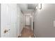 Bright hallway with tile flooring and ample closet space at 19522 N 84Th Ave, Peoria, AZ 85382