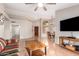 Open floor plan living room with a view to the kitchen and dining area at 19522 N 84Th Ave, Peoria, AZ 85382