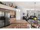 Kitchen features stainless steel appliances and an island at 20943 N 85Th Ln, Peoria, AZ 85382