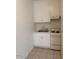 Efficient kitchen with white cabinets and appliances at 2150 W Missouri Ave # 121, Phoenix, AZ 85015