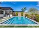 Relaxing rectangular pool with surrounding landscaping at 26741 N 74Th Ave, Peoria, AZ 85383