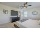 Relaxing bedroom with a large TV and window at 35165 N Jamaica Hope Way, San Tan Valley, AZ 85143