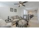 Relaxing living room with seating area and loft view at 35165 N Jamaica Hope Way, San Tan Valley, AZ 85143