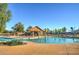 Community pool with fun water features for and adults at 4353 E Santa Fe Ct, Gilbert, AZ 85297