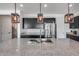 Kitchen island with granite countertop and stainless steel sink at 44261 W Palo Nuez St, Maricopa, AZ 85138