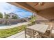 Patio with table and chairs, overlooking the pool and backyard at 5353 W Mercury Pl, Chandler, AZ 85226