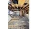 Unfinished bedroom with exposed framing and flooring at 6015 N 32Nd Dr, Phoenix, AZ 85017