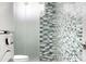 Bathroom with shower and stackable washer/dryer at 6834 E 4Th St # 7, Scottsdale, AZ 85251