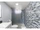 Bathroom with walk-in shower and mosaic tile at 6834 E 4Th St # 7, Scottsdale, AZ 85251