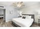 Spacious primary bedroom with plush bedding and accent wall at 6834 E 4Th St # 7, Scottsdale, AZ 85251