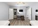 Bedroom with two twin beds, desk, and built-in closet at 6834 E 4Th St # 7, Scottsdale, AZ 85251