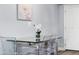 Small dining area with glass-top table and four chairs at 6834 E 4Th St # 7, Scottsdale, AZ 85251
