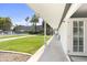 Complex exterior showing walkway, landscaping, and pool at 6834 E 4Th St # 7, Scottsdale, AZ 85251