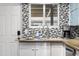 Modern kitchen with concrete countertops and stylish backsplash at 6834 E 4Th St # 7, Scottsdale, AZ 85251