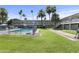 Inviting community pool with grassy area at 6834 E 4Th St # 7, Scottsdale, AZ 85251