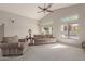 Bright and airy living room with sliding glass doors and pool view at 10051 E Pampa Ave, Mesa, AZ 85212