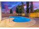 Inviting kidney-shaped pool with stone decking at 10051 E Pampa Ave, Mesa, AZ 85212